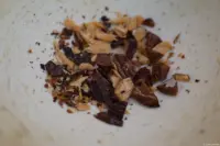 Tonkabohne im Mörser. Auto-Takumar 1.8/55 Zebra Tonkabohne