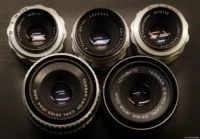 Alle fünf Modelle haben offenbar unterschiedliche Vergütungen. Carl Zeiss Jena Tessar 2.8/50 Altix coating